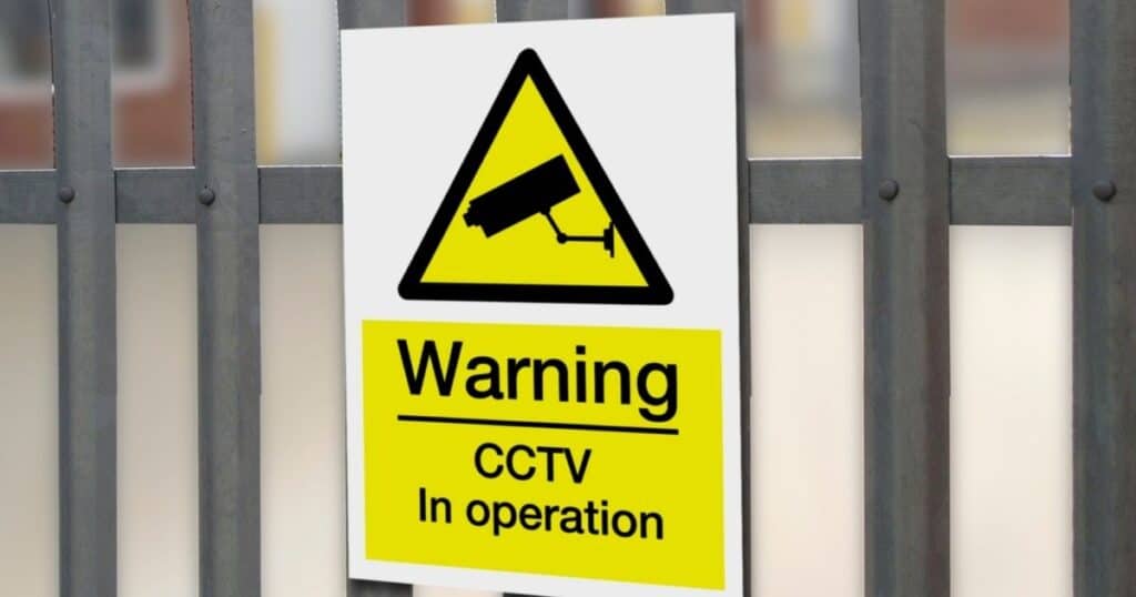 CCTv in operation - yellow signage